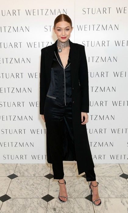 November 14: Gigi Hadid wore a Fleur Du Mal silk pajama jumpsuit to the private dinner hosted by Stuart Weitzman in London.
Photo: Darren Gerrish/WireImage