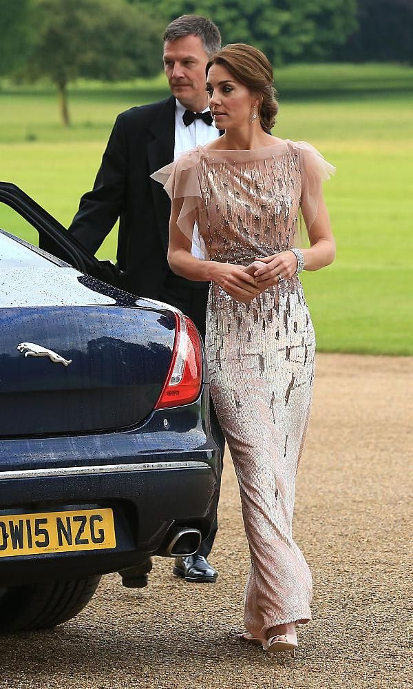 Kate Middleton in a Jenny Packham sequinned dress with see throught sleeves