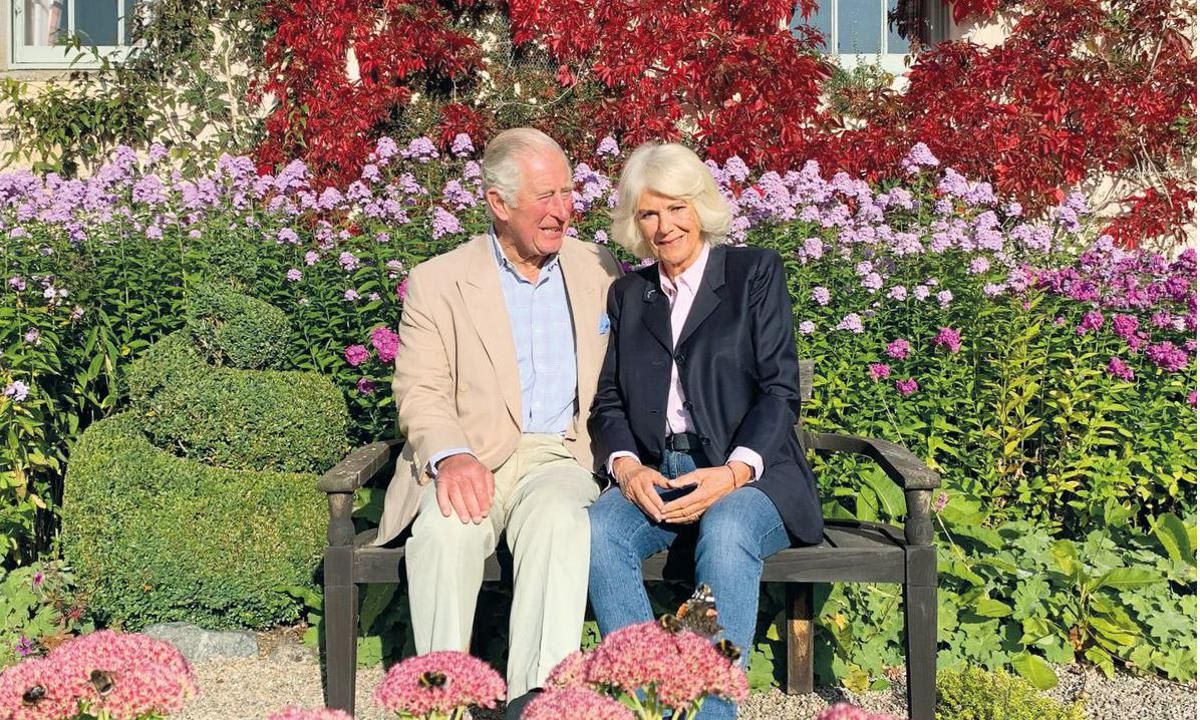 Charles and Camilla posed for their sweet photo on a bench in the garden at Birkhall