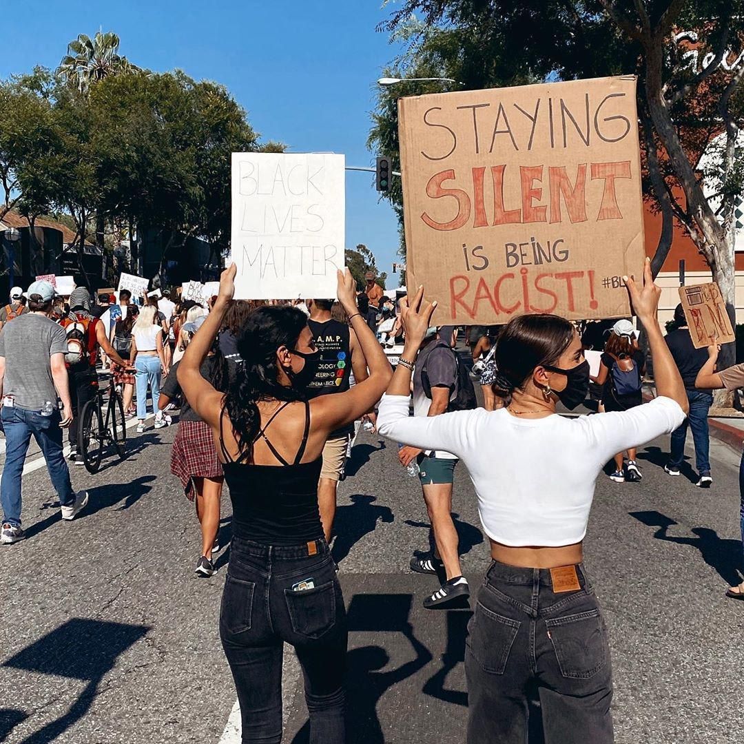 Camila Coelho protesting