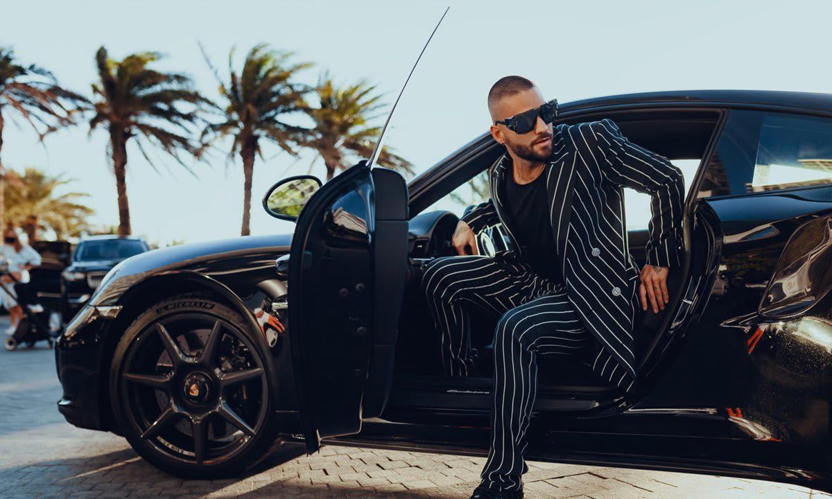 Maluma modeling his limited-edition ready-to-wear and sneakers Balmain line