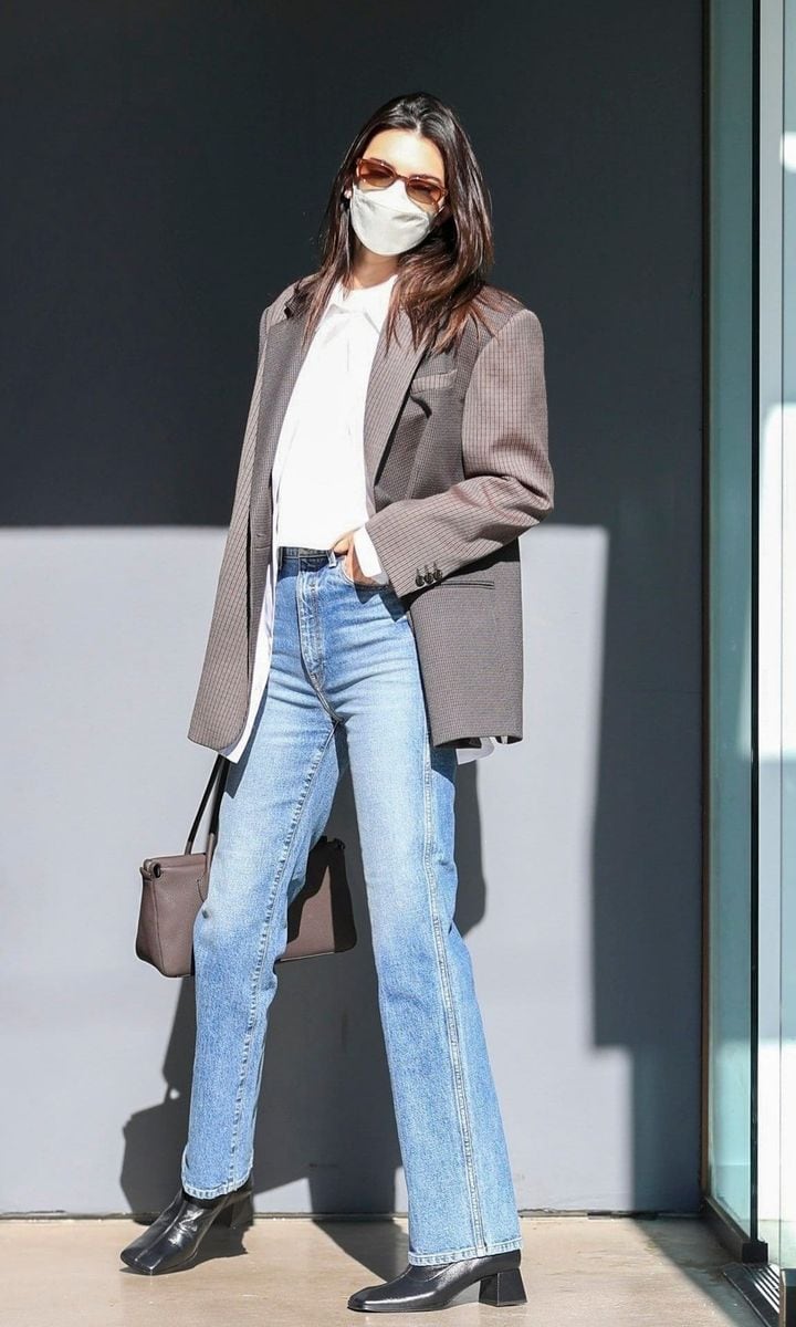 Model Kendall Jenner steals the spotlight on Melrose looking casual cool in a blazer with high waisted jeans as she records a show.