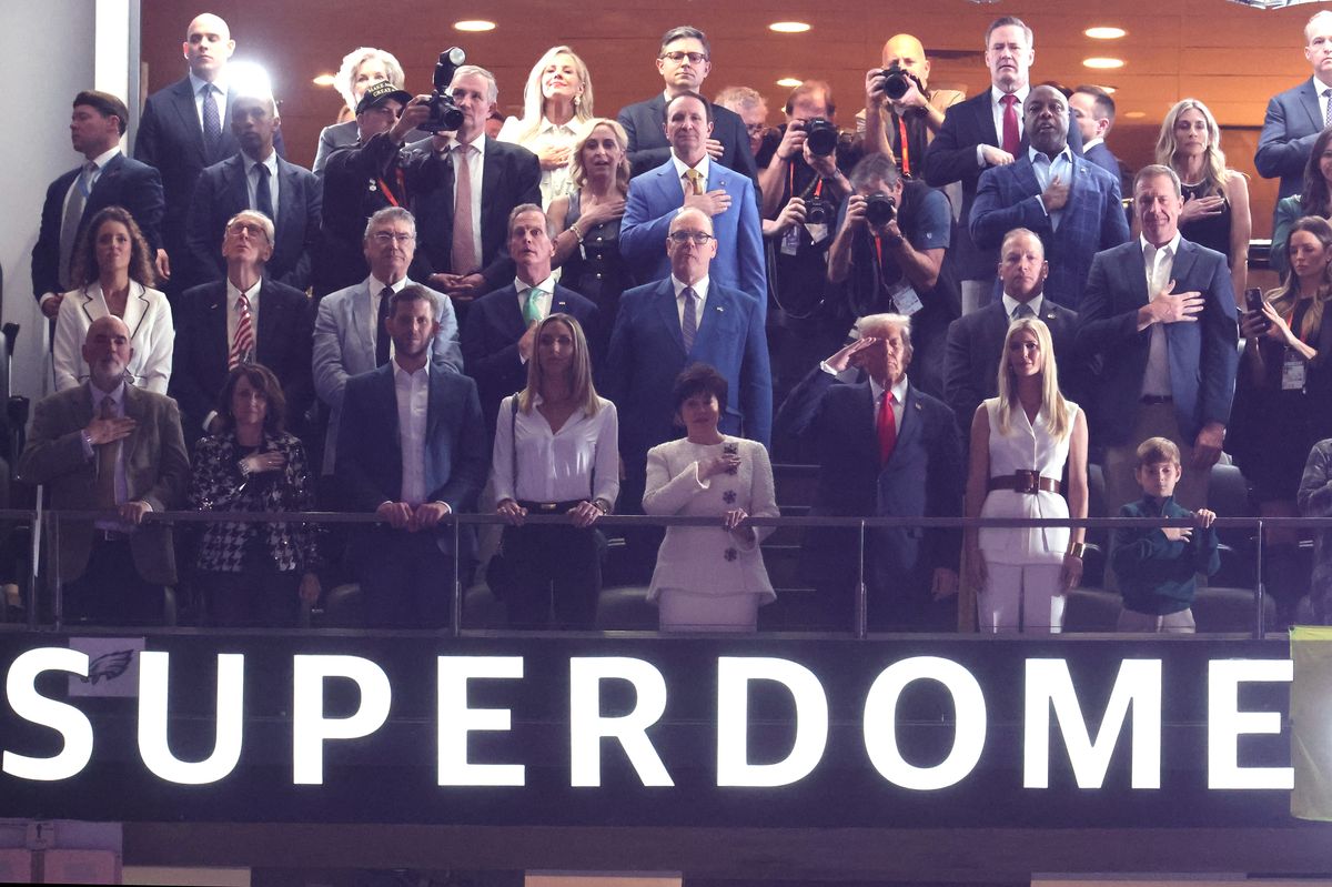 NEW ORLEANS, LOUISIANA - FEBRUARY 09: Eric Trump, Lara Trump, Jeff Landry, Prince Albert II of Monaco, Gayle Benson, U.S. President Donald Trump, Ivanka Trump, Sen. Tim Scott (R-SC), Michael Waltz and Eric Schmitt  stand for the national anthem before the Super Bowl LIX between the Kansas City Chiefs and the Philadelphia Eagles at Caesars Superdome on February 09, 2025 in New Orleans, Louisiana. (Photo by Jamie Squire/Getty Images)