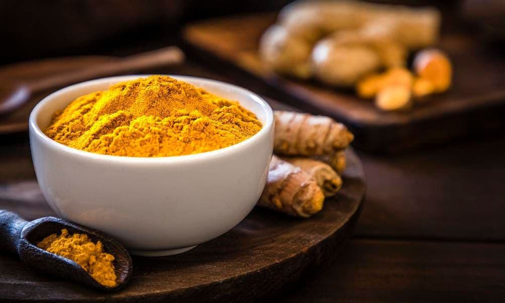 Bowl of ground turmeric