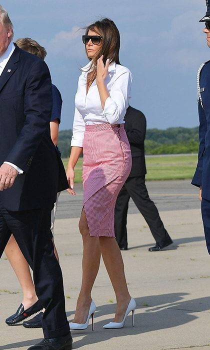 On June 30, the first lady looked all business in an Altuzarra pencil skirt and white blouse as she and her husband stepped off Air Force One upon arrival in Morristown, New Jersey.
Photo: MANDEL NGAN/AFP/Getty Images