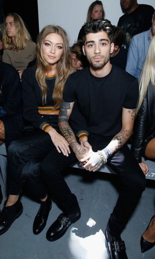 Gigi Hadid and Zayn Malik showed they are definitely back on at Versus Versace.
Photo: Darren Gerrish/WireImage