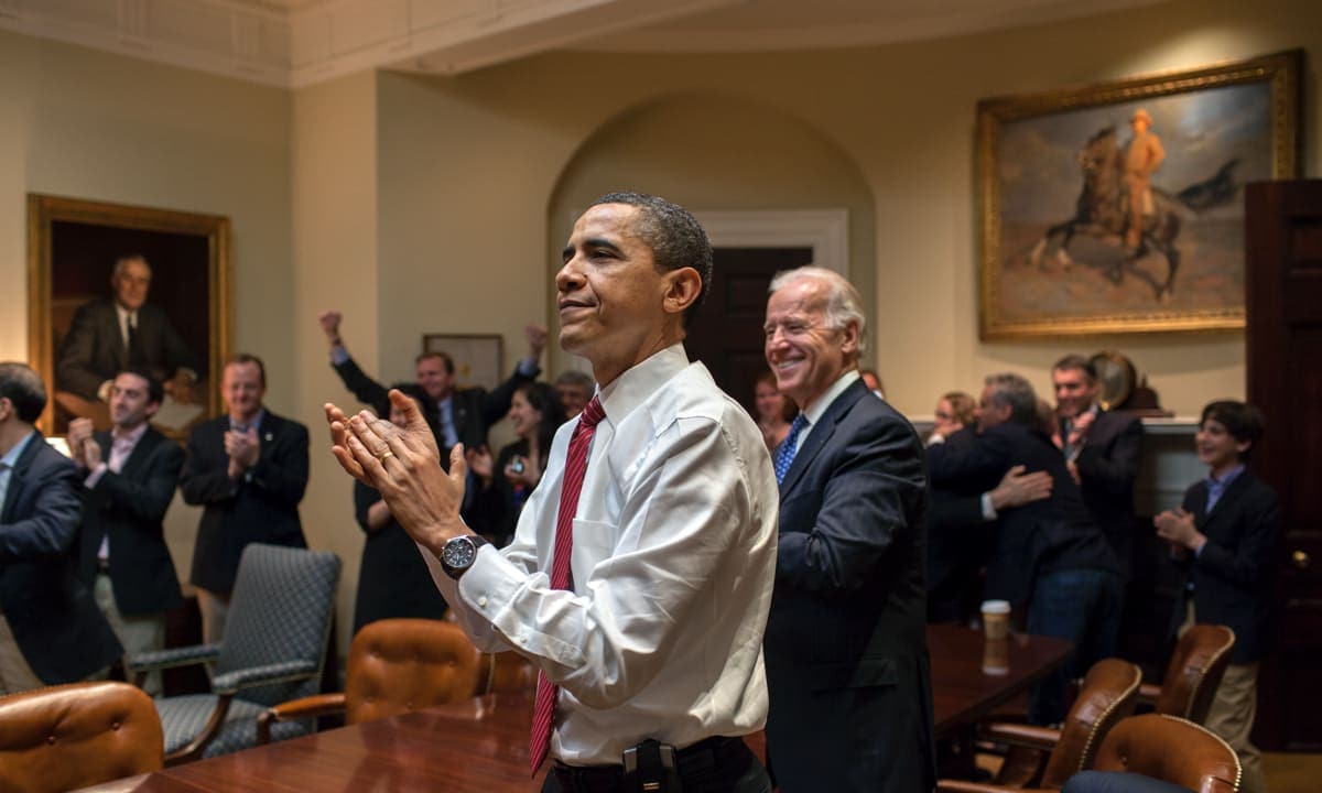 President Barack Obama, Vice President Joe Biden, and senior officials in the Roosevelt Room.