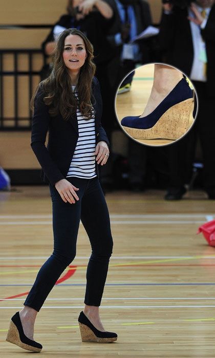 Teaming her wedges with other fave staples including her Breton top and navy blue blazer, Kate was ready for a round of volleyball during a SportsAid event in 2013.
<br>
Photo: Getty Images