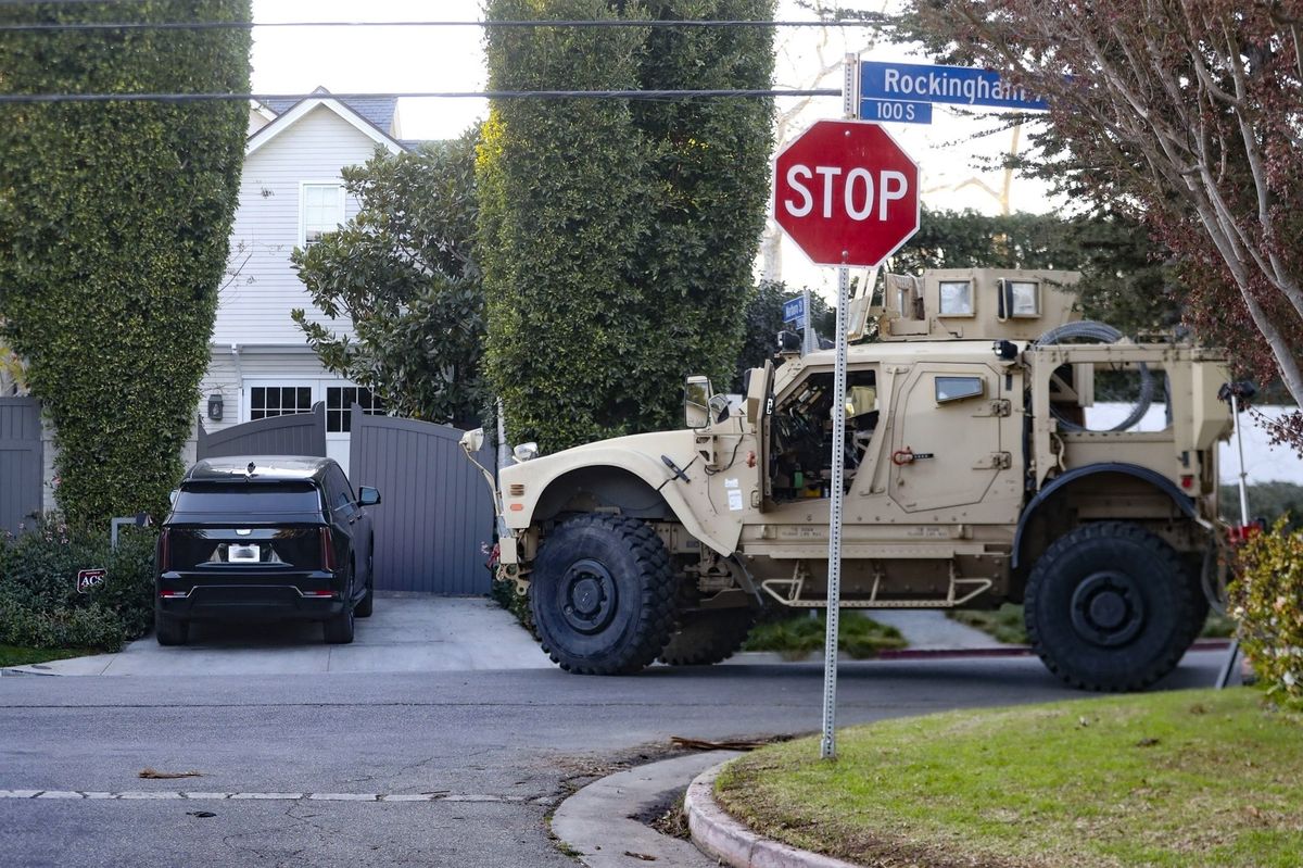 Ben Affleck returned to his residence, drawing attention from a joint light tactical military vehicle stationed nearby. 