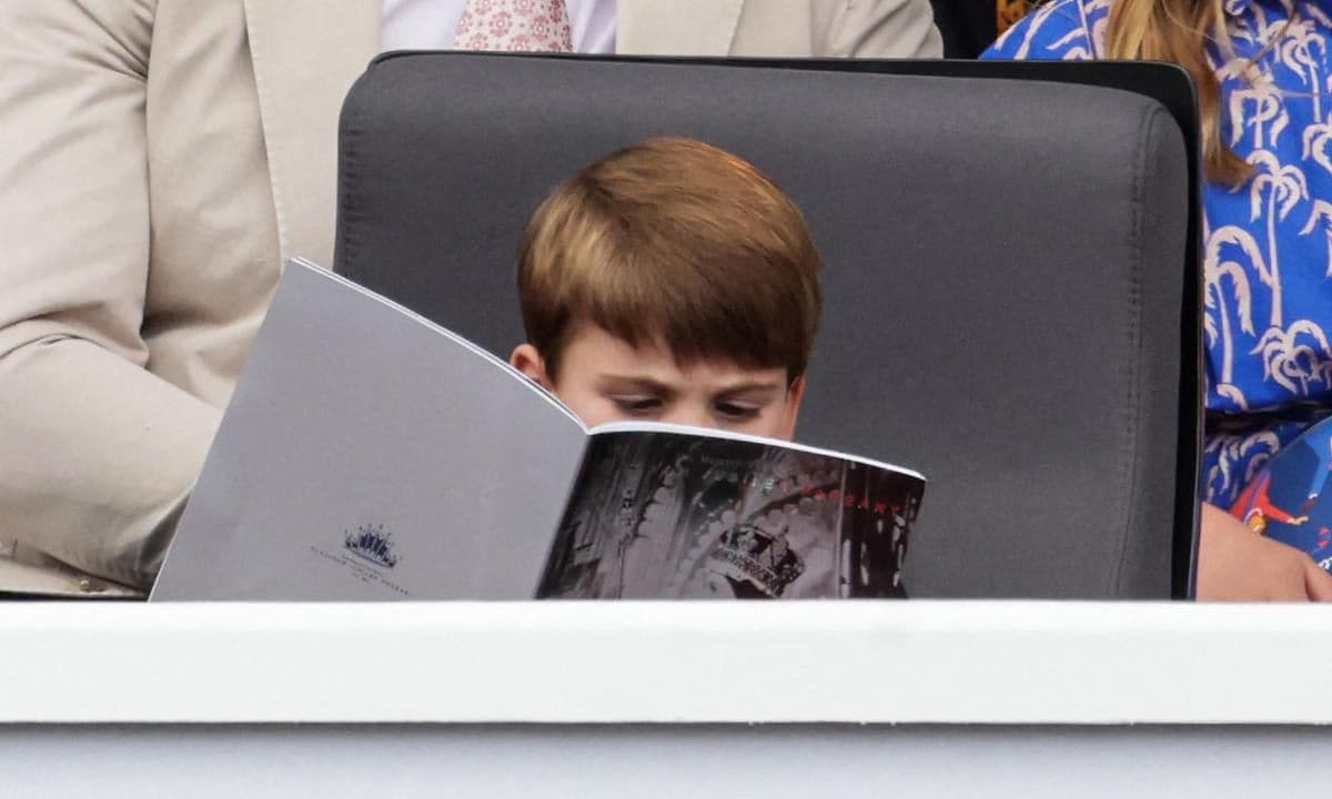 The Prince checked out a program for his great-grandmother's Platinum Jubilee Pageant.