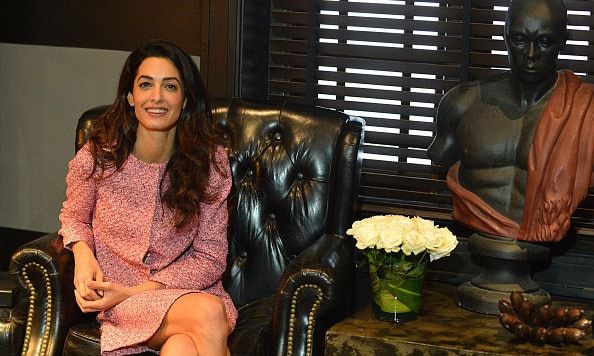 Amal wore a pink printed suit for a meeting in the Sri Lankan capital.
<br>
Photo: Getty Images