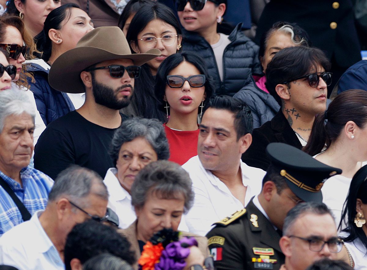 Leonardo Aguilar, Angela Aguilar, and Christian Nodal attend the Military Civic Parade in the Zocalo in Mexico City, Mexico, on September 16, 2024