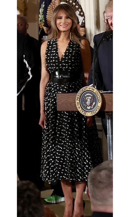 Melania wore a tea length black and white dress with a v-neck for the annual Wounded Warrior Project Soldier Ride at the White House. Melania accentuated her waist wearing a thick black belt.
Photo: Win McNamee/Getty Image