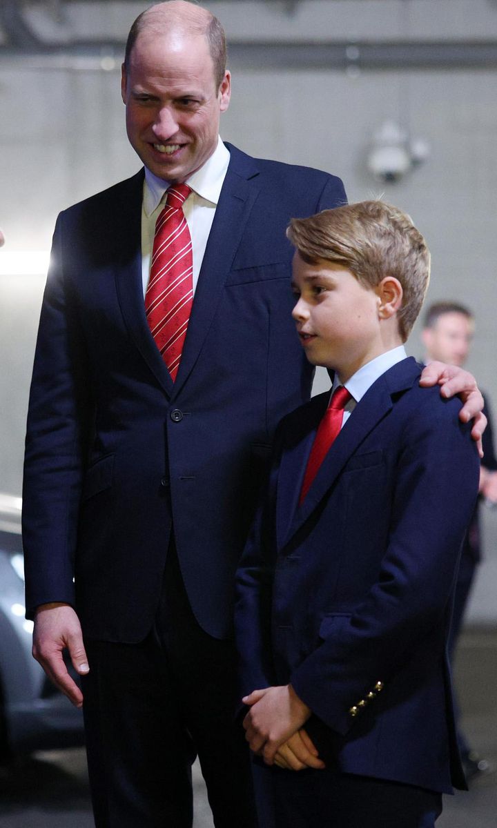 Prince William (pictured on Oct. 14 with Prince George) revealed that his eldest child is doing triathlon at school