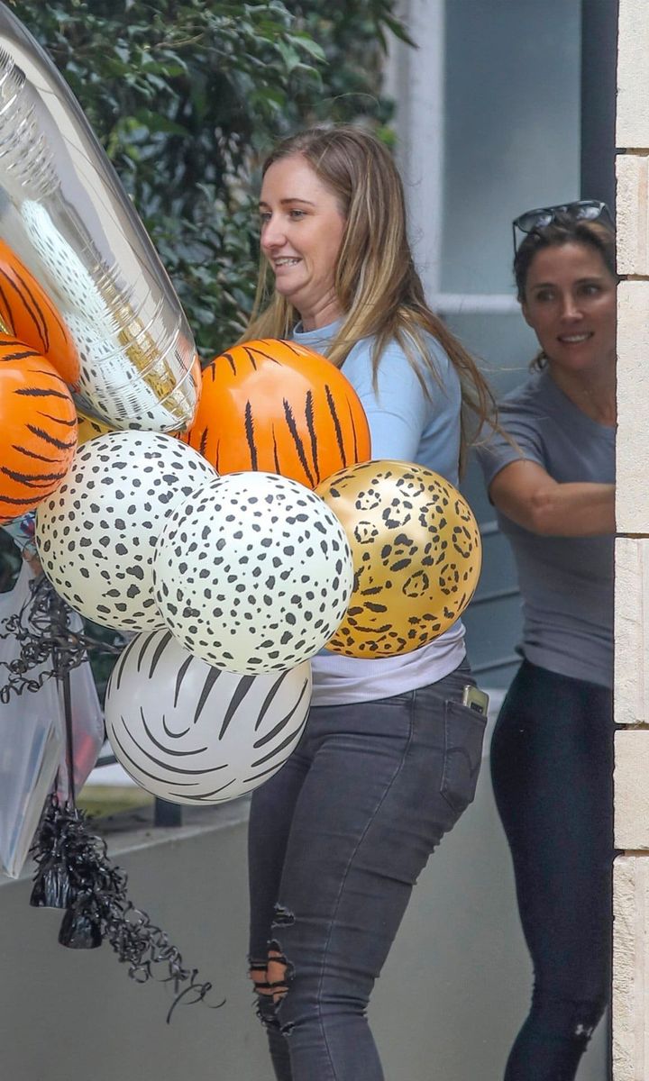 Elsa Pataky receiving balloons for her sons' birthday