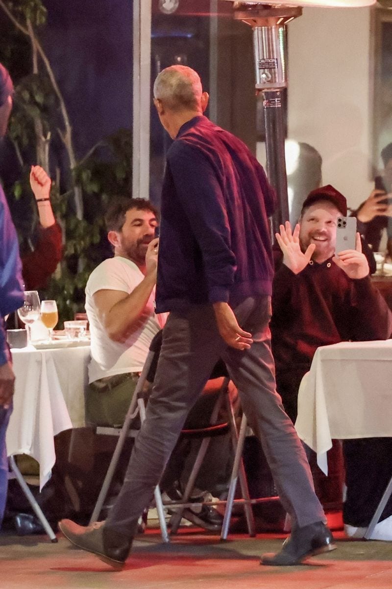 Bystanders were surprised by Barack Obama's presence at the restaurant, taking photos of him and saying hello