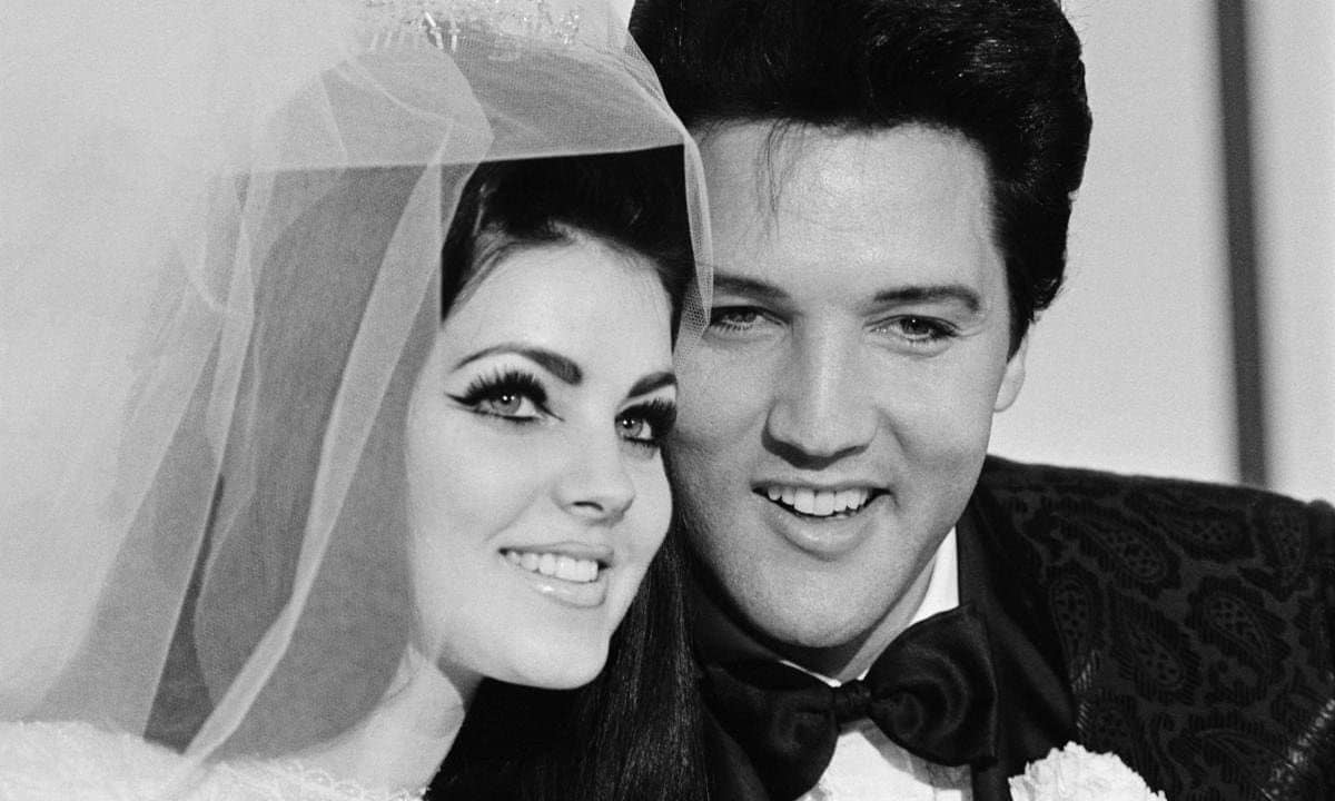 Pricilla and Elvis Presley on their Wedding Day