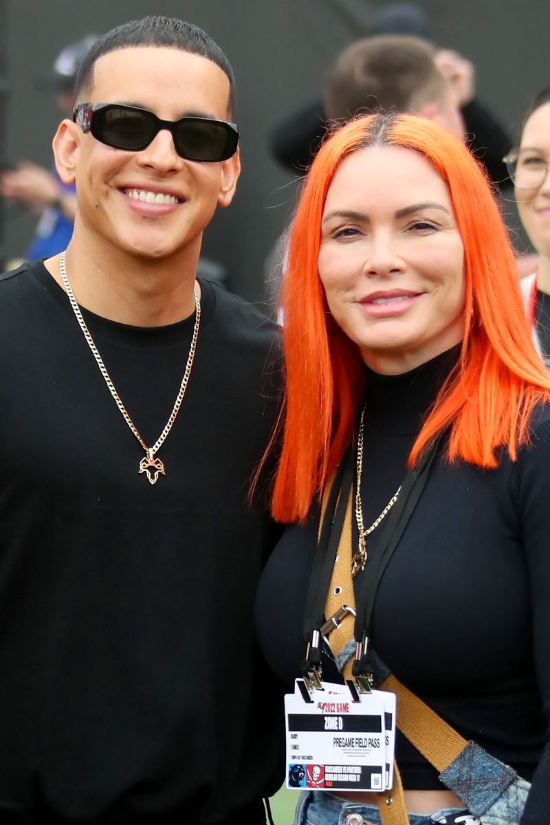 Ramon Luis Ayala Rodriguez, known professionally as Daddy Yankee and Mireddys Gonzalez pose before the regular season game between the Carolina Panthers and the Tampa Bay Buccaneers 