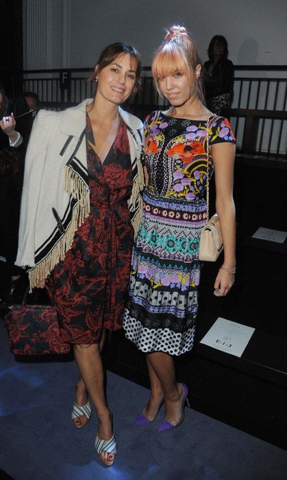 Like mother like daughter. British model Yasmin Le Bon (left) attended the Temperley fashion show in a colorful frock with her daughter Amber (right).
<br>
Photo: Getty Images