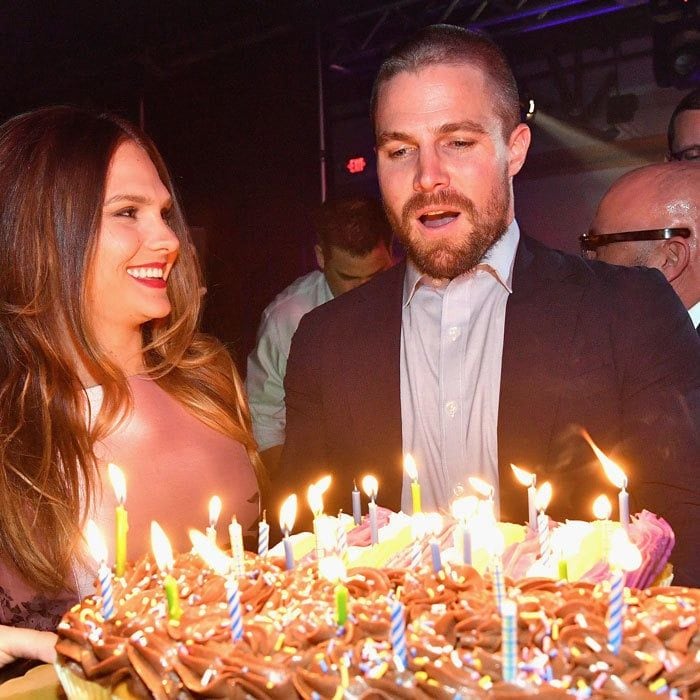 Stephen Amell, who attended with his wife Cassandra Jean, was surprised with a birthday cake and engraved bottle of Gran Patron at the Fillies and Stallions party in Louisville, Kentucky.
Photo: Getty Images