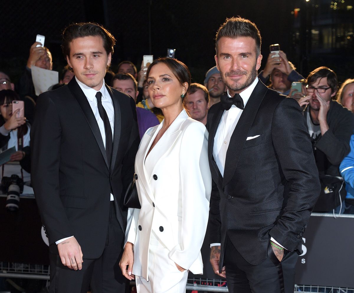 Brooklyn Beckham, Victoria Beckham and David Beckham attend the GQ Men Of The Year Awards 