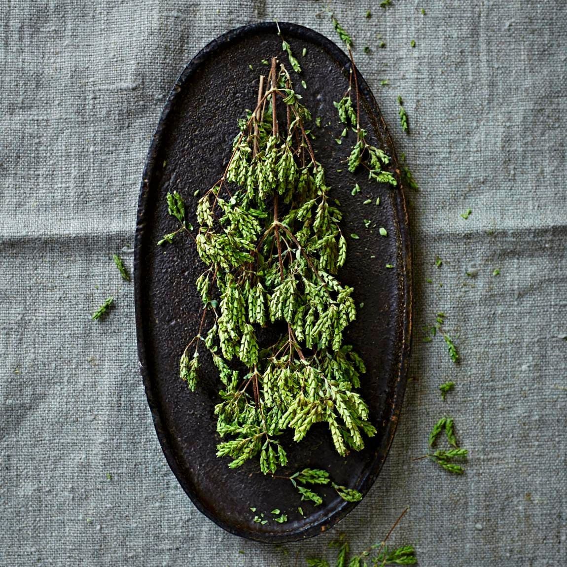 Dried wild oregano on an oval plate