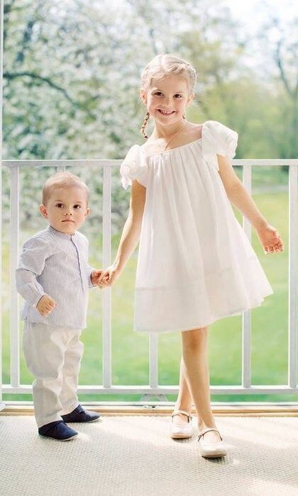 For a June 2017 photo shoot with little brother Prince Oscar, five-year-old Princess Estelle of Sweden wore a sweet little white dress from <b>H&M</B>'s Conscious collection.
Photo: Facebook/Kungahuset