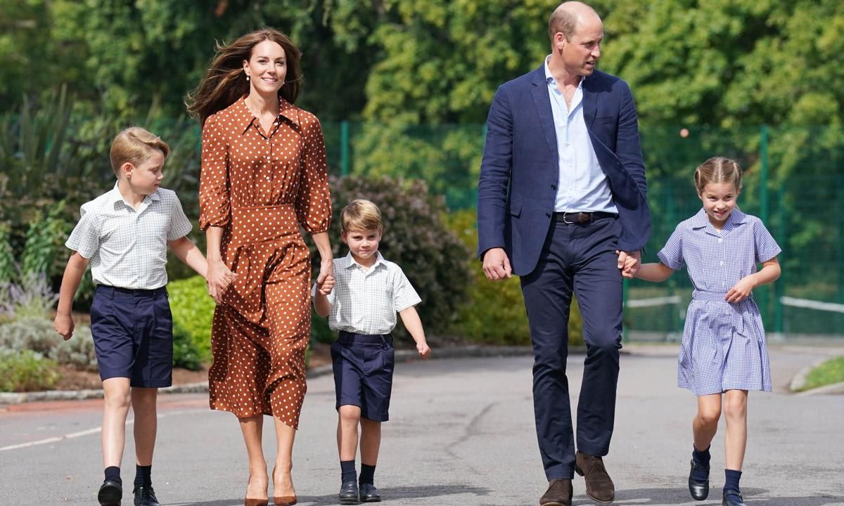 Charlotte, dressed in her blue belted gingham dress, had her hair styled up in a ponytail for the event.