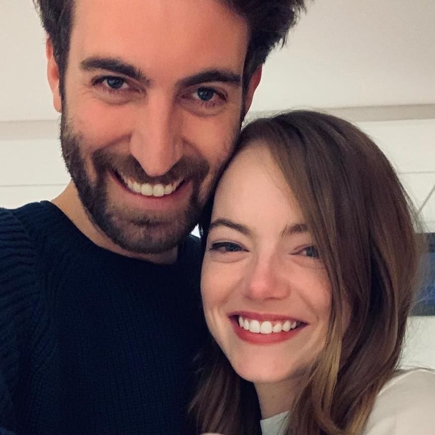 Emma Stones shows engagement ring with fiance Dave Mccary