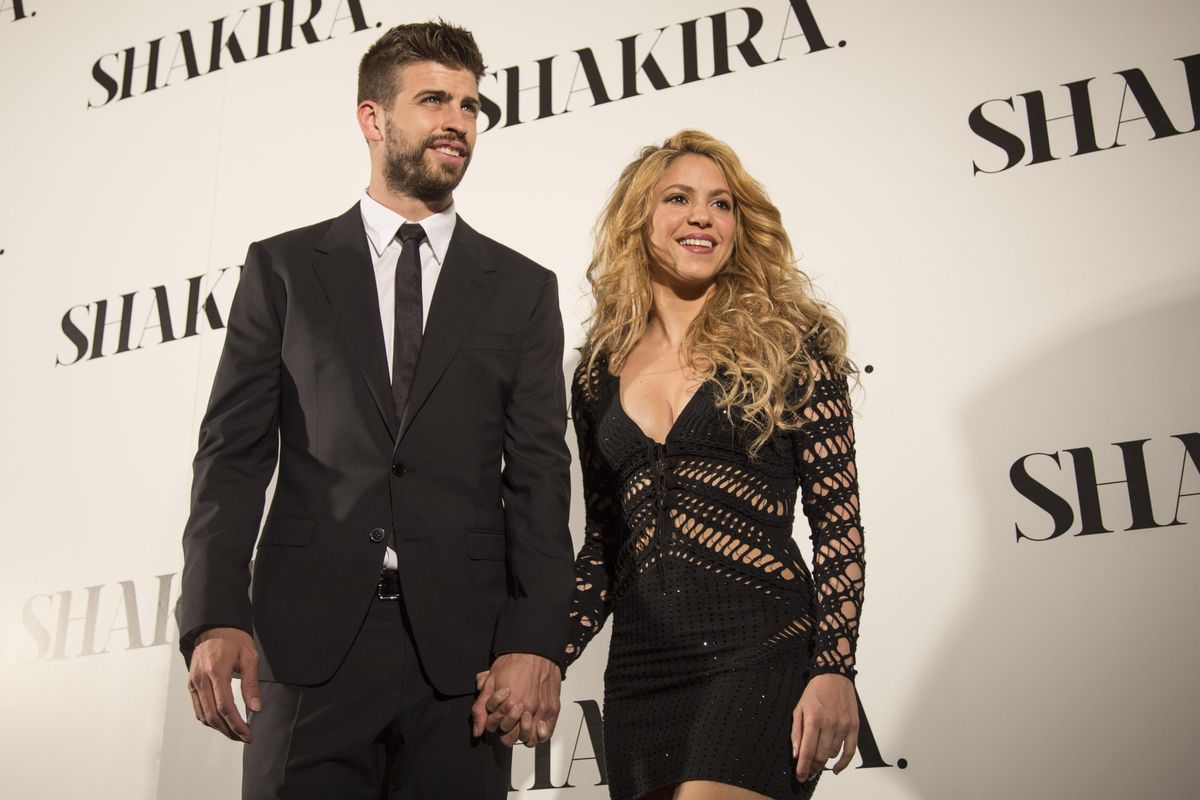 Shakira and her ex Gerard Pique posing for a photo during the presentation of her new album 'Shakira' in Barcelona, Spain. 