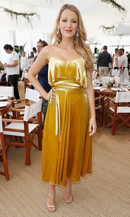 <a href="https://us.hellomagazine.com/tags/1/blake-lively/"><strong>Blake Lively</strong></a> shines on in a spaghetti-strap midi with ribbon belt.
<br>
Photo: Getty Images