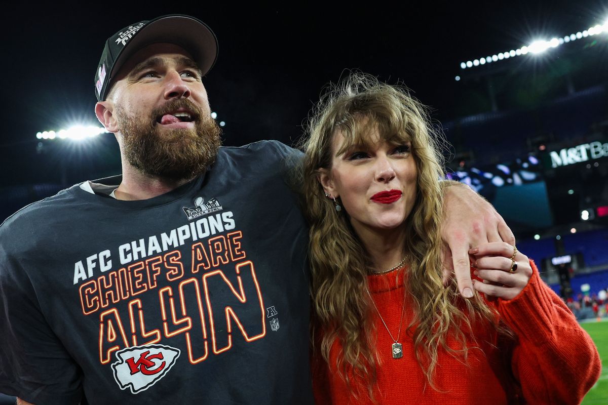 Travis Kelce celebrates with Taylor Swift after defeating the Baltimore Ravens 