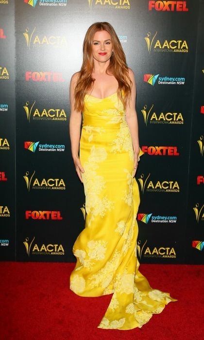 Isla Fisher channeled her inner Belle in a flowing dress by Monique Lhuillier during the 6th AACTA International Awards in L.A. The <i>Nocturnal Animals</i> actress told HELLO! of her dress choice: "I just really loved the color. It seemed really bright."
Photo: JB Lacroix/WireImage