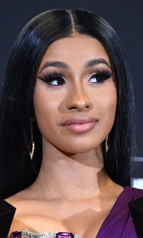 Cardi B with straight hair and lined eyes