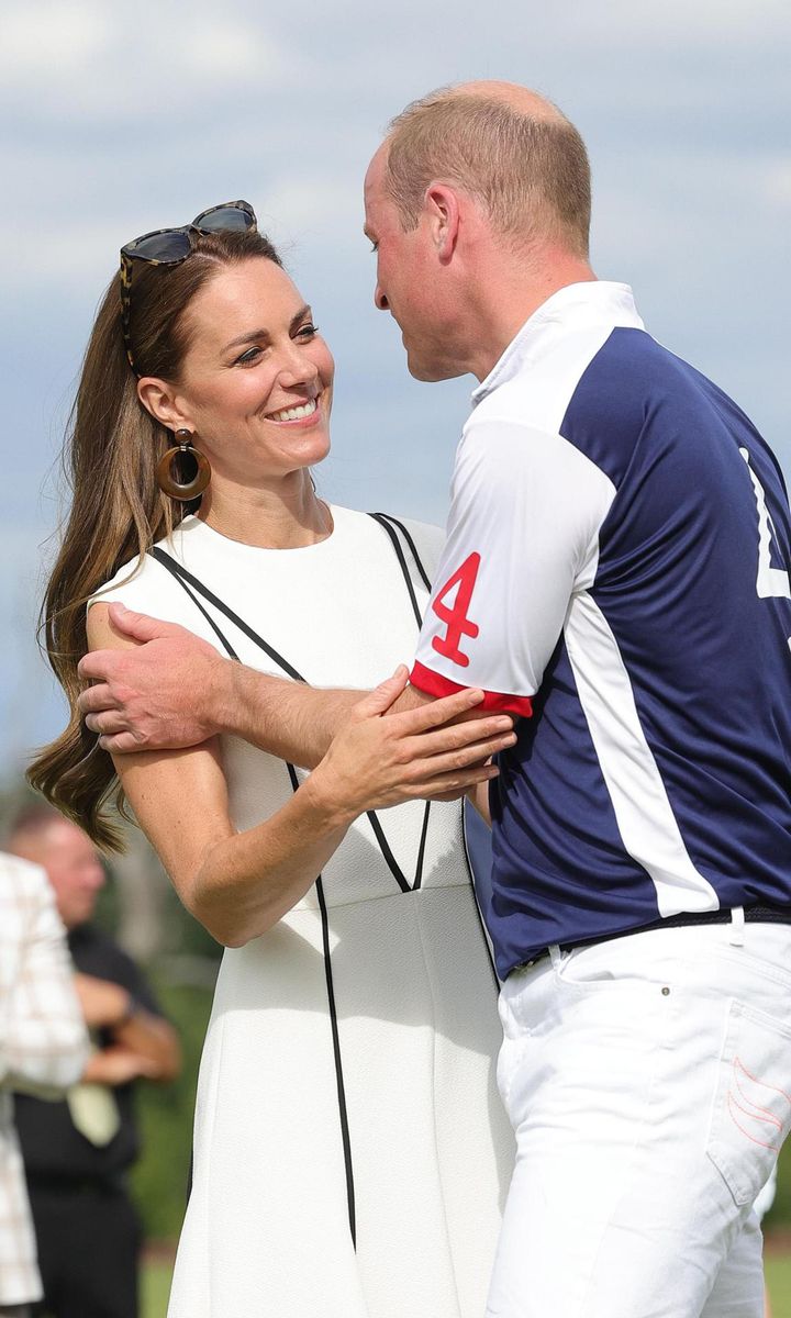 The parents of three publicly kissed on International Kissing Day.