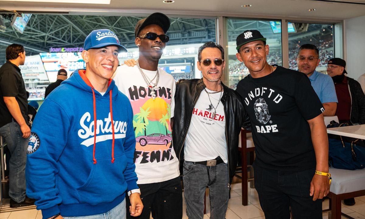 Daddy Yankee, Marlins star Jazz Chisholm, Marc Anthony and Marlins Coach Jon Jay at loanDepot Park in Miami for the World Baseball Classic hosted by the Miami Marlins