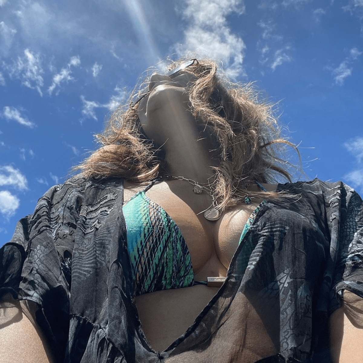 Halle Berry posts in a bikini