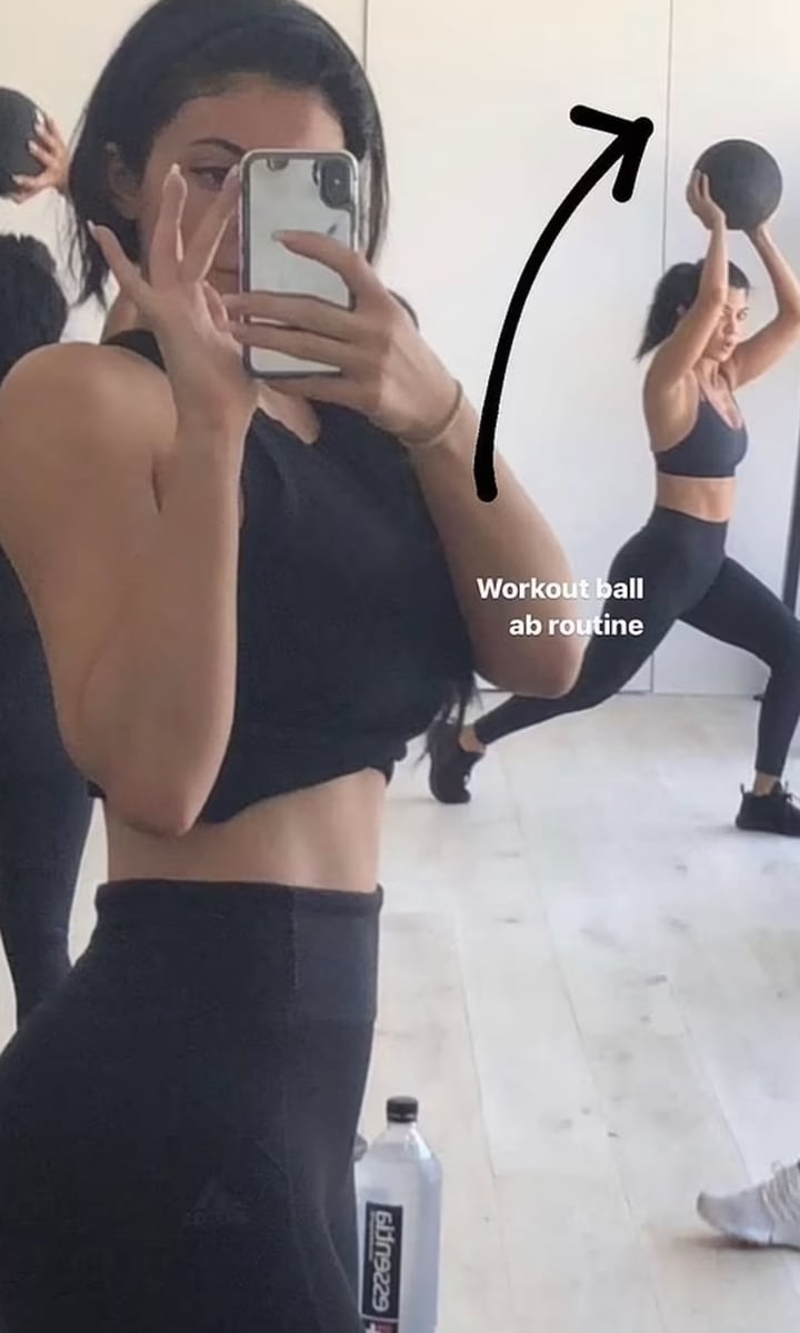 Kourtney Kardashian shows off her toned abs during workout with Kylie Jenner