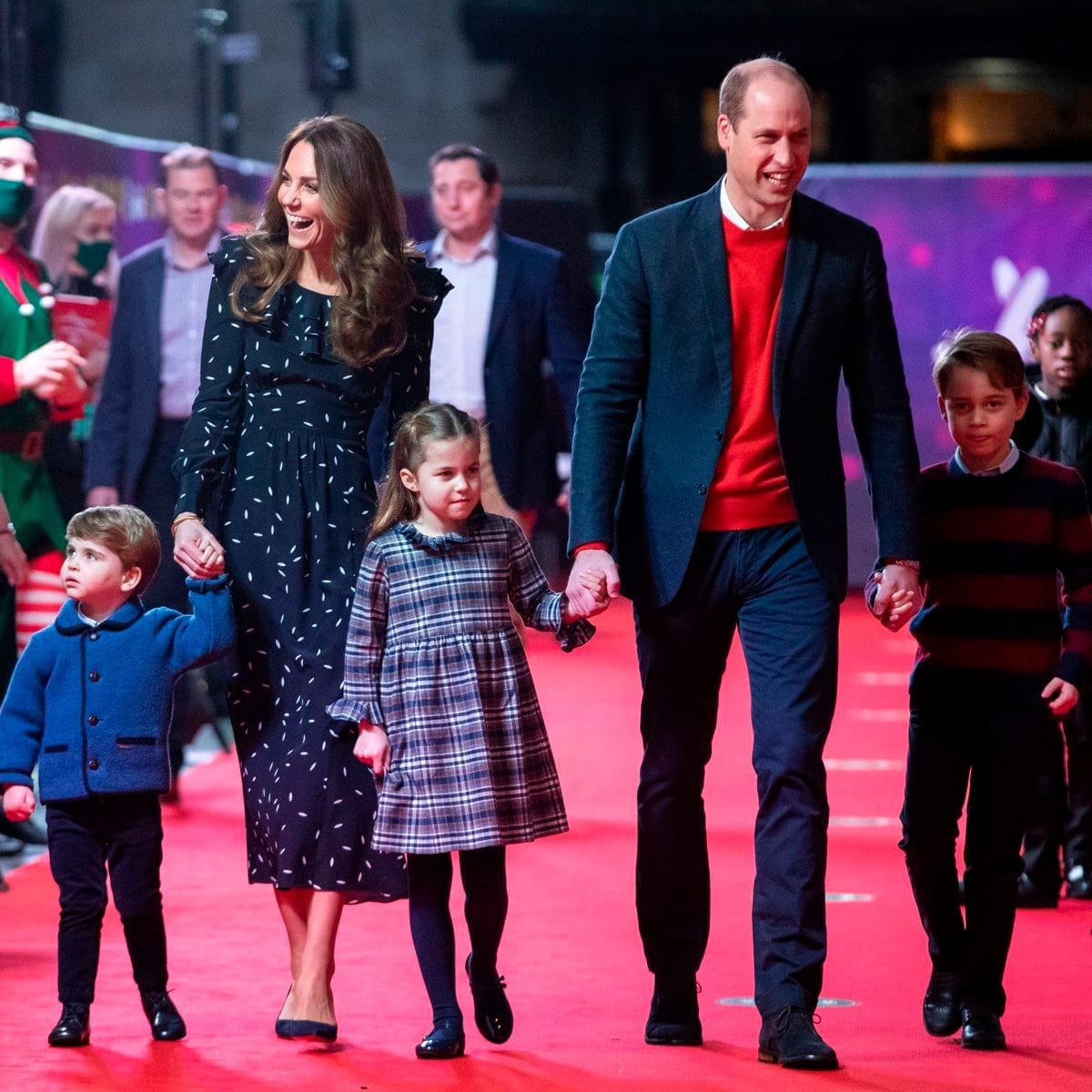 The Duchess of Cambridge exuded sophistication in an Alessandra Rich dress, while Princess Charlotte sported an adorable tartan dress and tights. Louis wore his big brother's blue Amaia Kids jacket. Prince George looked all grown up wearing a red and navy striped sweater and trousers.
