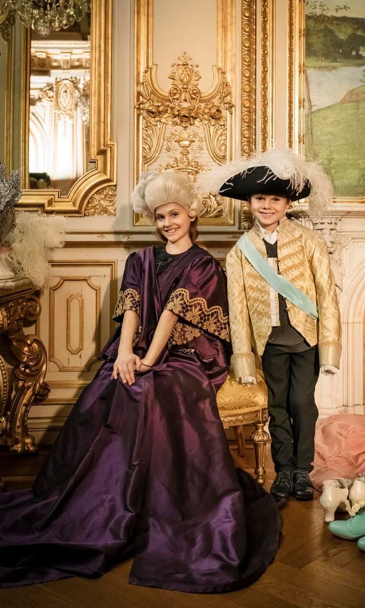 The young Prince and Princess tried on costumes at the Royal Opera House.