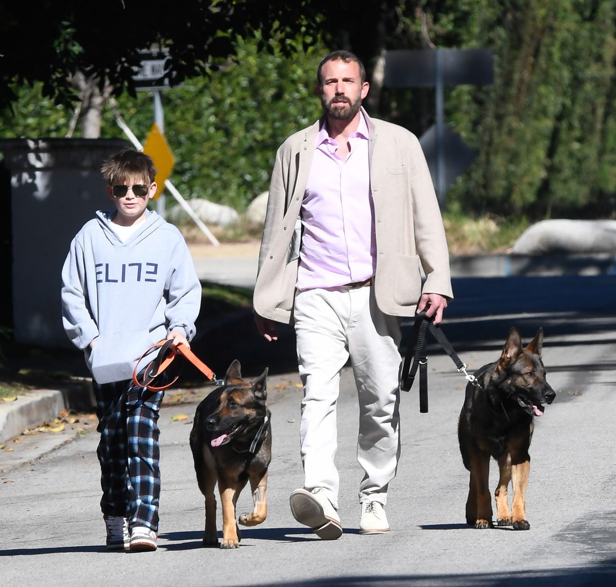 Ben and Samuel Affleck walking their new dogs