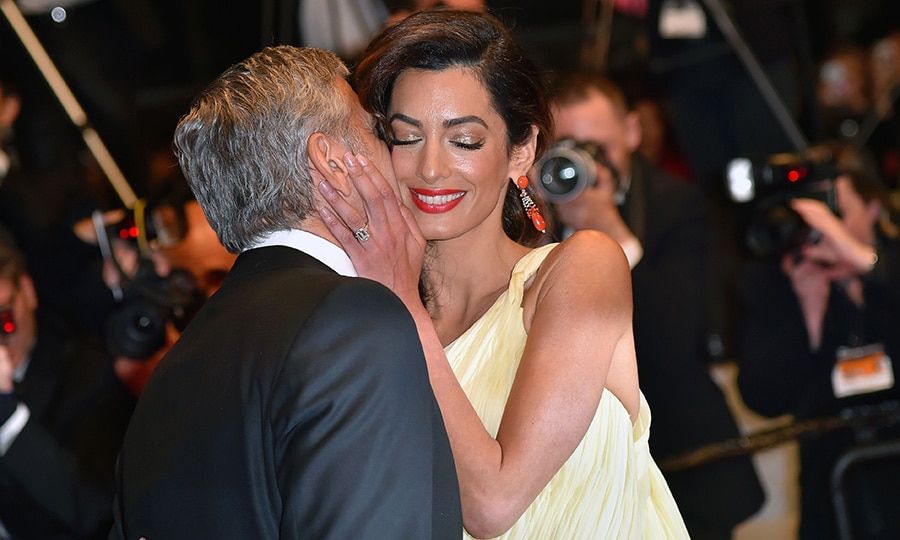 George Clooney and wife Amal showed their love on the red carpet, too.
Photo: Getty Images