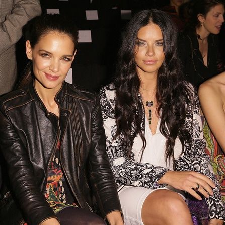 Katie Holmes and Adriana Lima sat next to each other front row at Desigual.
Photo: Getty Images