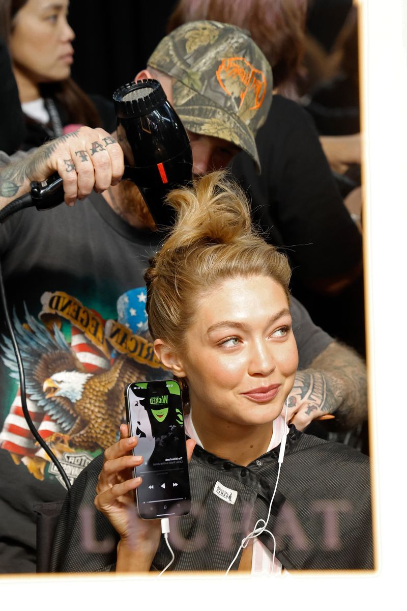 Gigi Hadid in hair and makeup backstage for the 2024 Victoria's Secret Fashion Show at Duggal Greenhouse on October 15, 2024 in Brooklyn, New York. (Photo by Taylor Hill/WireImage)