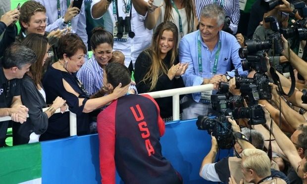 Michael's mom and fiance cried tears of joy after he brought home gold medal number 20.
<br>
Photo: Getty Images