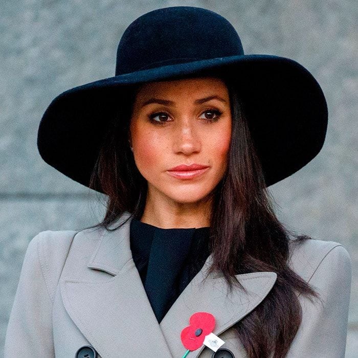 <b>One of the earliest style lessons a future royal must learn is: get used to wearing a hat! Thanks to protocol, hats are a definite royal style staple, worn to weddings, church services, and of course <a href="https://us.hellomagazine.com/tags/1/royal-ascot/"><strong>Royal Ascot</strong></a>. Since leaving <I>Suits</I> and beginning her life as a royal bride-to-be, <a href="https://us.hellomagazine.com/tags/1/meghan-markle/"><strong>Meghan Markle</strong></a> has shown us <a href="https://us.hellomagazine.com/fashion/12018032826440/meghan-markle-purse-top-handle-handbag/"><strong>some amazing handbags</strong></a>, gorgeous Princess-worthy outfits, and some very chic hats to top off her wardrobe! Scroll through to take a look at <a href="https://us.hellomagazine.com/tags/1/prince-harry/"><strong>Prince Harry</strong></a>'s fiancee's collection of marvellous millinery, from beautiful berets to wide-brimmed wonders.</B>
Meghan made on of her biggest hat statements to date when she attended the Anzac Day dawn service at Hyde Park Corner in London with Prince Harry on April 25, 2018. Instead of a smaller beret style, the future royal bride donned a floppy oversized hat with a wide brim to accessorise her bold-shouldered coat.
Photo: TOLGA AKMEN/AFP/Getty Images