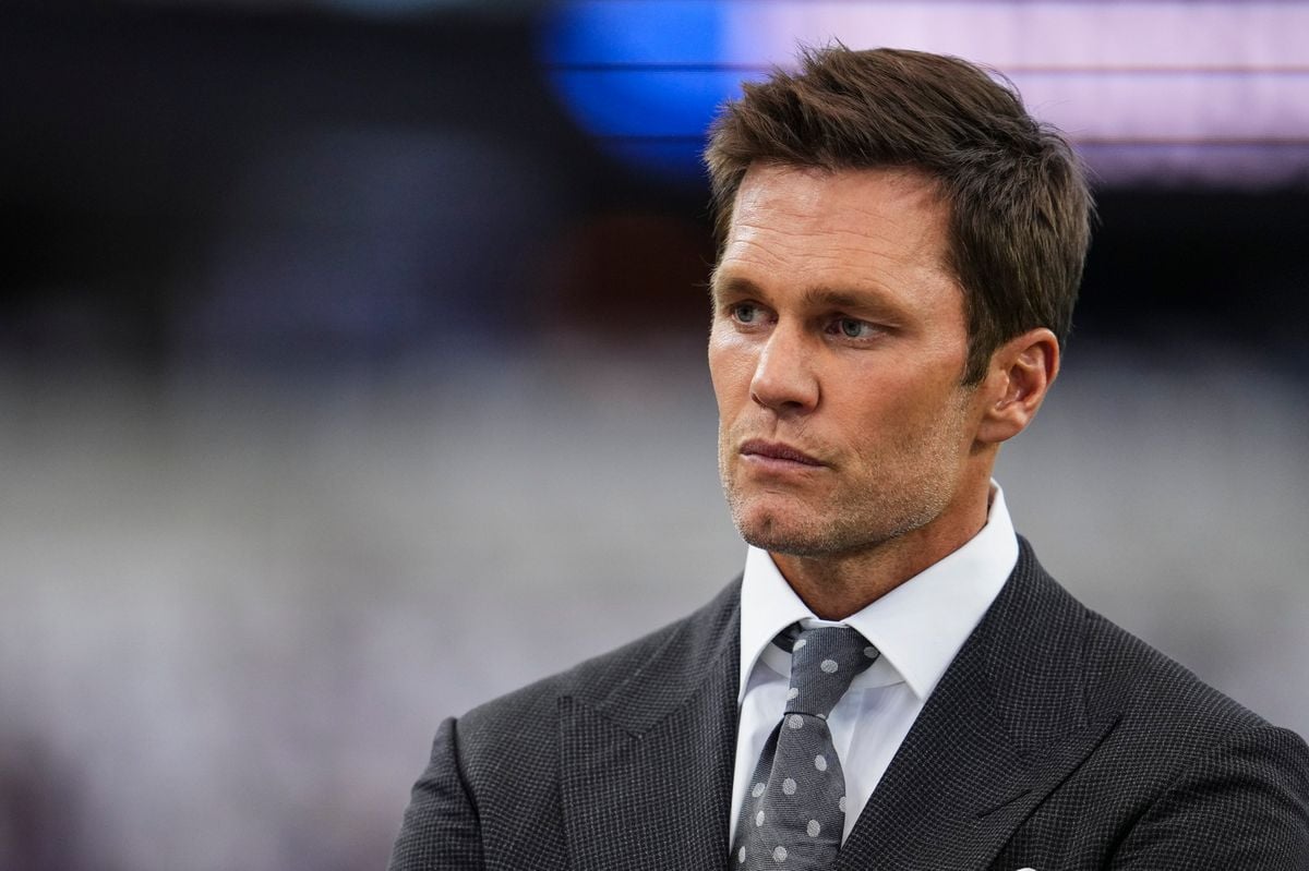     Tom Brady looks on before an NFL football game between the Baltimore Ravens and the Dallas Cowboys at AT&T Stadium on September 22, 2024 in Arlington, Texas. (Photo by Cooper Neill/Getty Images)