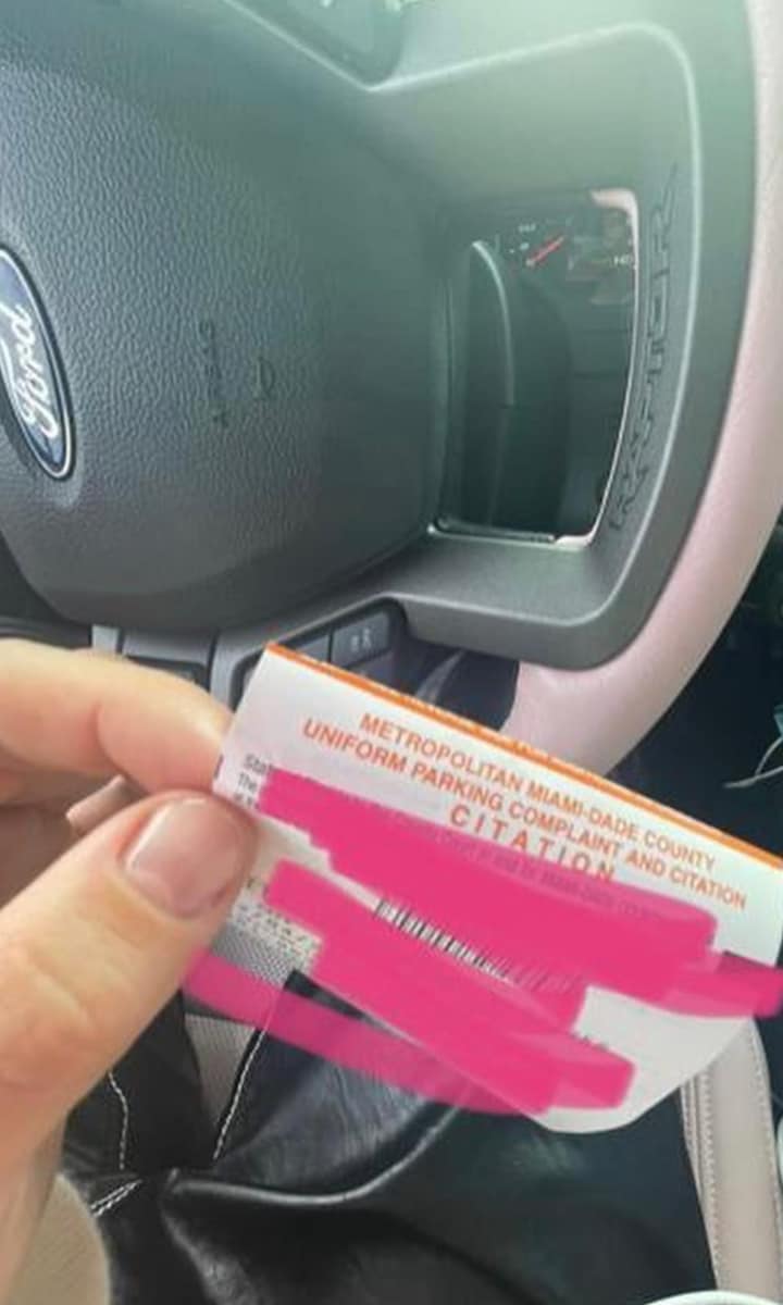 Rosalía gets a citation for a parking violation in Miami