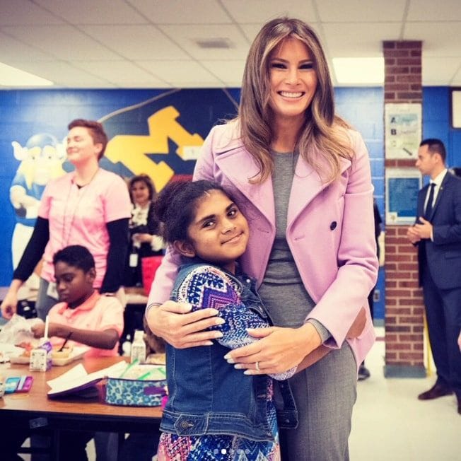 The first lady went to Orchard Lake Middle School in Michigan to meet with students and promote the #nooneeatsalone campaign. For her day with the kids, the former model kept in casual in a Valentino peacoat over a grey sweater and trousers.
Photo: Instagram/@flotus
