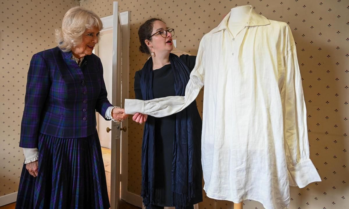 Camilla was shown the shirt worn by Colin Firth in the BBC series during a visit to Jane Austen's House on April 6